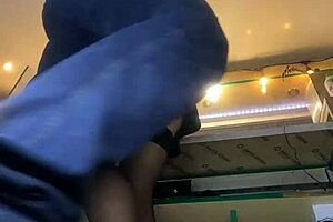 This sexy MILF has long legs and big pussy lips, upskirt at work.