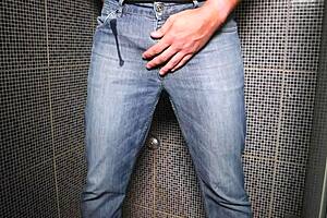 Guy pees inside his jeans and delivers a cumshot on the end!