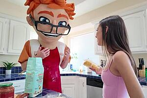 Petite brunette Eva Generosi sucks big cock and swallows cum in kitchen.