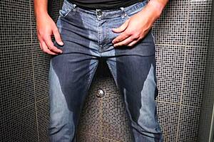 Guy pees inside his jeans and delivers a cumshot on the end!