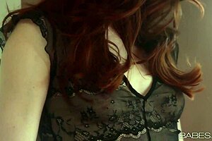 stoya poses in black lingerie solo