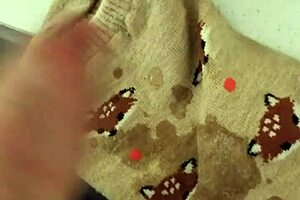 Cute coworker receives cum in her socks during intimate office encounter