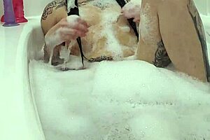 Why does Emy Angel adore taking her bath?