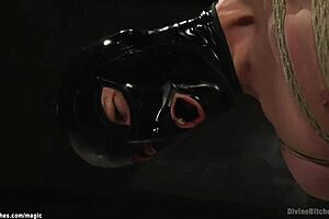 Busty Femdom Pegs Man In Suspension