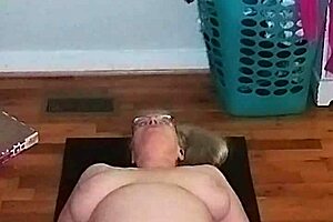 mature woman engages in early morning yoga session