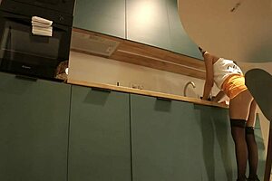 Cute Housewife Flashes Panties In Kitchen