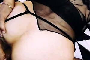 A wife in erotic fishnet spreads legs beautifully