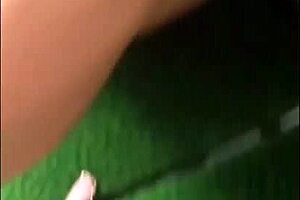 A cute girl savored her lollipop during the train ride