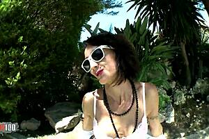 Hot milf Lyna Cypher strips wildly outdoors! 🔥🌿