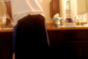 tidying up the bathroom during house chores