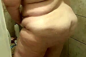 curvy bbw wife sneaks a wash in the shower before getting caught
