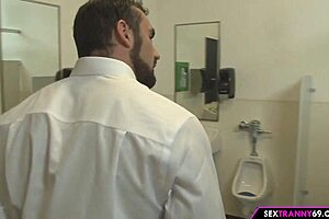 shemale tempts throbbing cocks through gloryhole