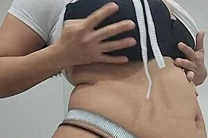 latina storyteller caresses her massive swaying tits