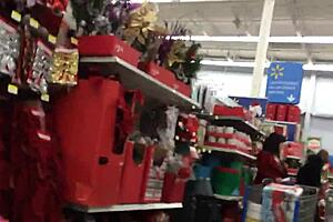 A candid mom browses shops unaware in hidden footage