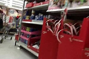 A candid mom browses shops unaware in hidden footage