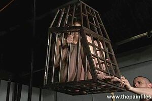 isabel deans endures cage bondage foot whipping bastinado torment