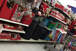 A candid mom browses shops unaware in hidden footage