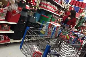 A candid mom browses shops unaware in hidden footage