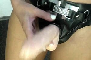 Hey mistress teases with huge strapon ready to dominate