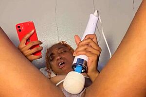 ebony beauty stuffs panties deep in her tight wet pussy for explosive orgasm