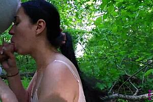 Young black haired slut sucks fat cock to forest cum swallow