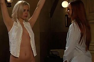 Mistress fingers her bound blonde slave hard