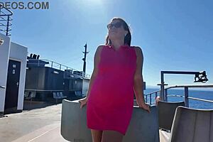 Curvy brunette flashes big tits and pussy publicly on beach