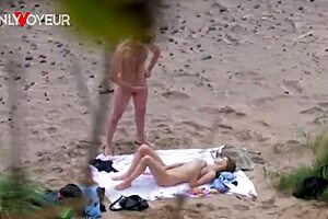 Beach voyeur couple strokes each other to passionate cumshots