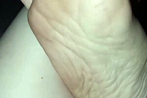 barefoot tease slips her foot into shadowy unknown depths