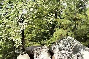 Shemale strokes glass dildo on road