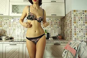 Naughty milf's solo masturbation moans fill kitchen