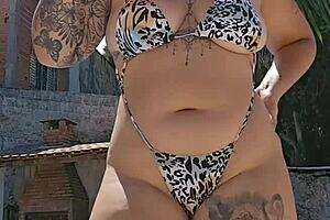 Wife flaunts tight bodysuit on her big ass while husband watches silently