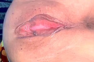 Amateur shaved pink pussy closeup post virginity loss