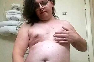 Intense arousal builds in shemale's teasing panty striptease