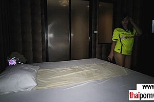 Petite Thai masseuse kneads client's shoulders and body smoothly