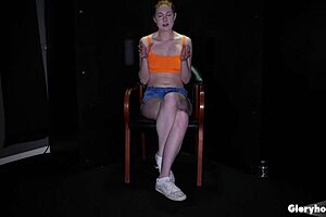 Big titted redhead devours dicks at gloryhole