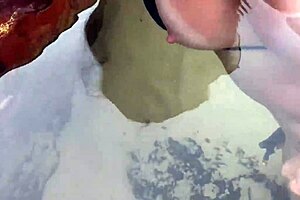 A stranger pumps hot cumshot feeding sperm to beach fish publicly