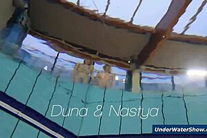 Horny Czech blondes rip bikinis and strip nude in pool underwater