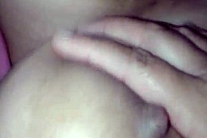 Latina Tetona Fingers Her Massive Tits Seductively