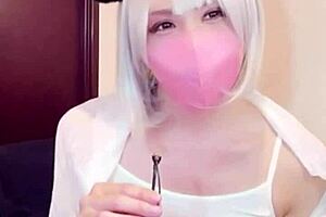 masked asian ladyboy crossdresses masturbates on cam solo