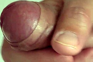 Close-Up View of Intense Solo Masturbation with Shaved Pussy Spreading Wide