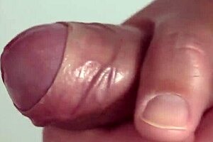 Close-Up View of Intense Solo Masturbation with Shaved Pussy Spreading Wide