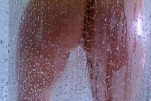 Watch her big ass bounce curves in steamy teen shower fun