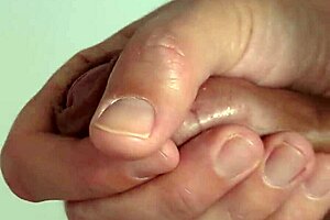 Close-Up View of Intense Solo Masturbation with Shaved Pussy Spreading Wide