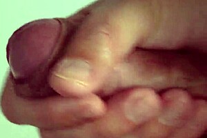 Close-Up View of Intense Solo Masturbation with Shaved Pussy Spreading Wide