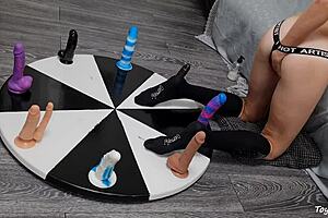 Petite Wife Spins Wheel of Huge Dildos for Rough Anal Orgasm Ride