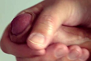 Close-Up View of Intense Solo Masturbation with Shaved Pussy Spreading Wide