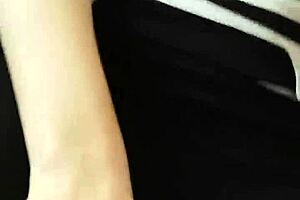 A flirty babe teases riders on the crowded train.