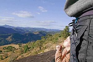 Tourist guide flashes monster cock at curvy tourist on mountain trail outdoors