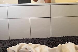 MILF Busts Intense Jerk-Off in Steamy Bathroom